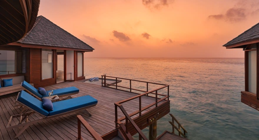 Sunset Over Water Villa